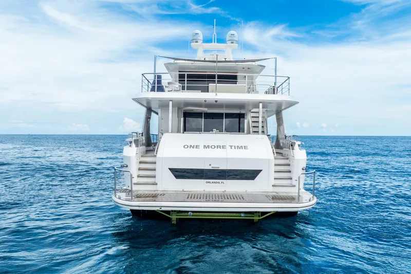 Slide: The Image of Luxury Horizon FD80 yacht on open sea, 2020 model, clear blue sky. - 13