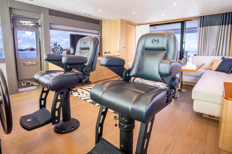 Slide: The Image of Luxurious interior of 2020 Horizon FD80 yacht with plush seating and ocean view. - 31