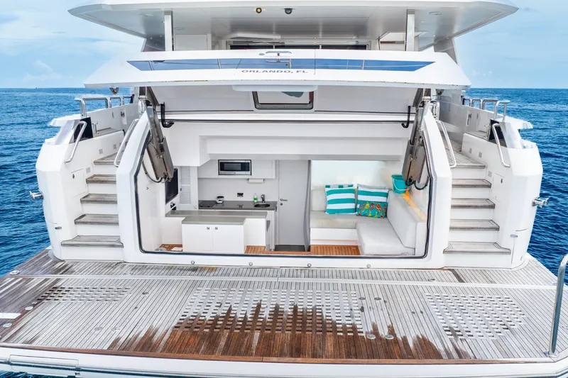 Slide: The Image of Luxurious Horizon FD80 yacht interior with kitchenette and seating, 2020 model, on open sea. - 33