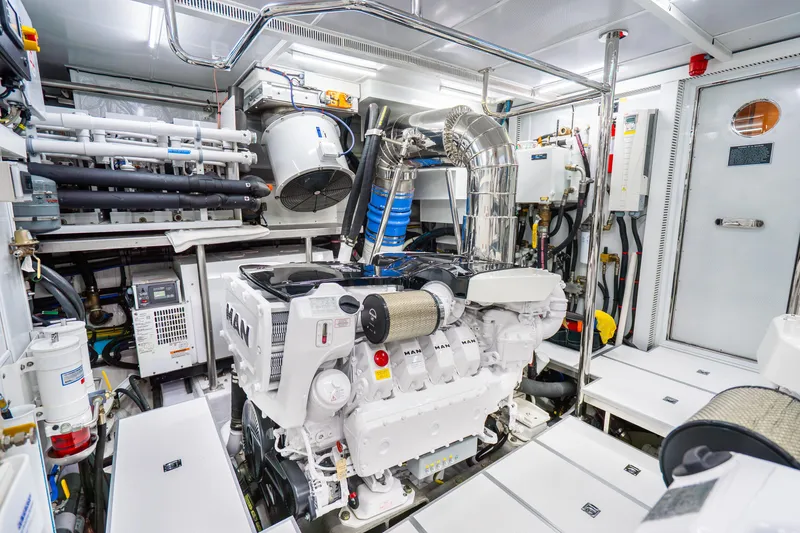 Slide: The Image of Engine room of 2020 Horizon FD80 yacht, featuring advanced machinery and equipment. - 38