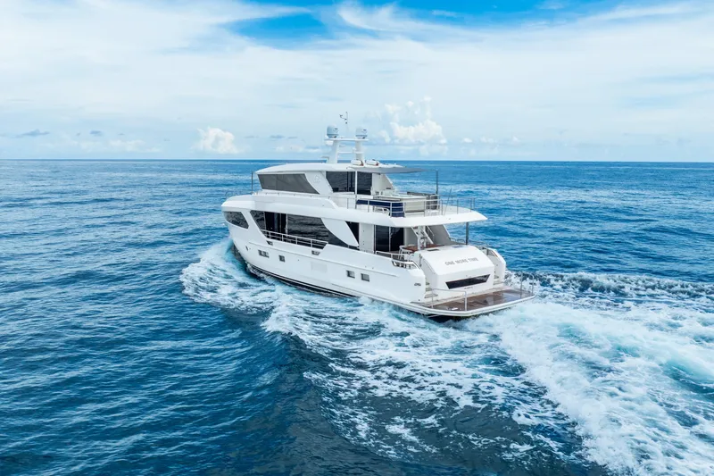 Slide: The Image of Luxurious 2020 Horizon FD80 yacht cruising on open ocean under clear blue sky. - 4