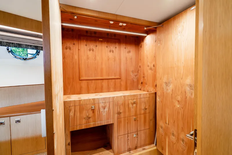 Slide: The Image of Luxurious wooden interior of 2020 Horizon FD80 yacht cabin with built-in storage. - 43