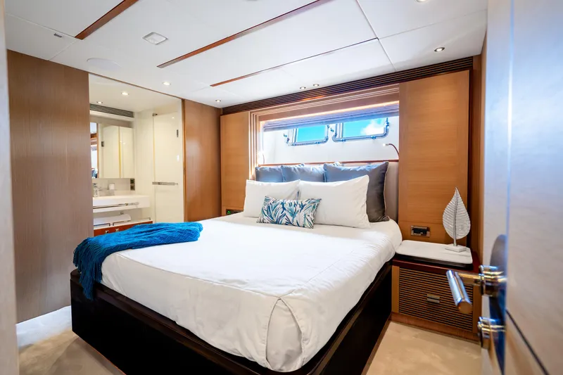 Slide: The Image of Luxurious bedroom interior on 2020 Horizon FD80 yacht with modern design and elegant decor. - 49