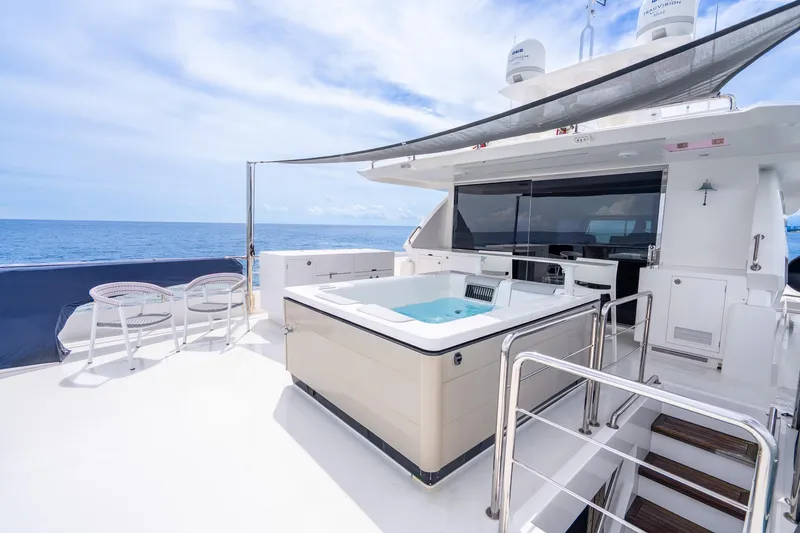 Slide: The Image of Luxurious 2020 Horizon FD80 yacht deck with hot tub and ocean view. - 66