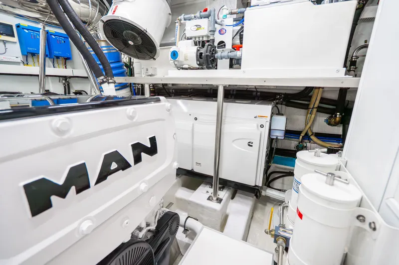 Slide: The Image of Engine room of 2020 Horizon FD80 yacht featuring MAN engine and advanced machinery. - 77