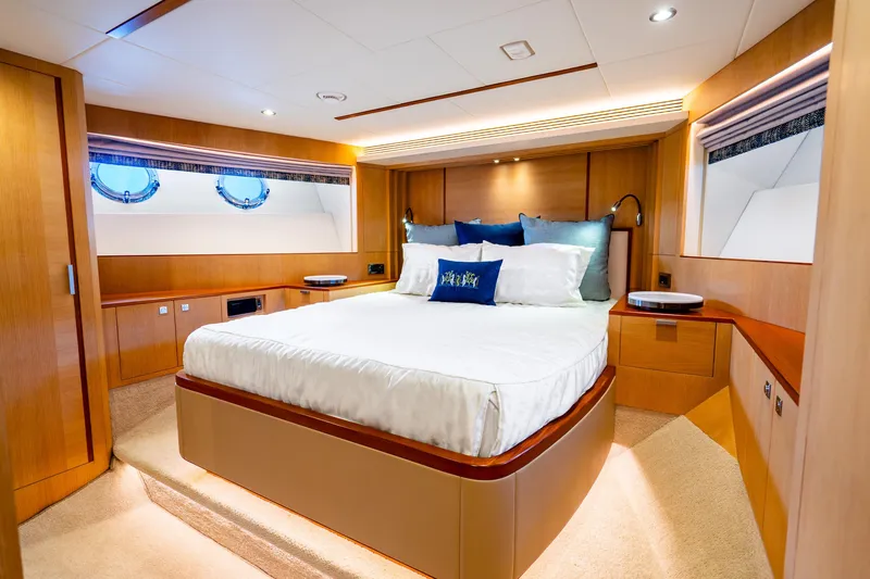 Slide: The Image of Luxurious bedroom interior on 2020 Horizon FD80 yacht with elegant wood finishes. - 87