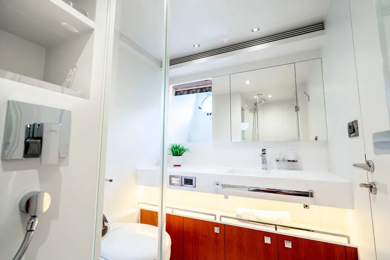 Slide: The Image of Luxurious bathroom interior on 2020 Horizon FD80 yacht, featuring modern fixtures and elegant design. - 89