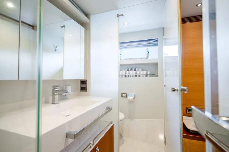 Slide: The Image of Modern bathroom interior on 2020 Horizon FD80 yacht, featuring sleek design and amenities. - 93