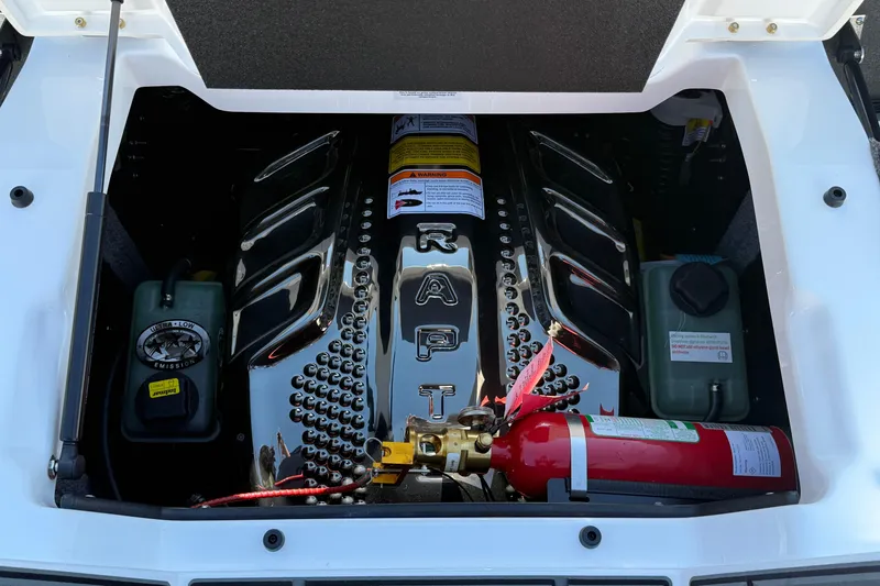 Slide: The Image of Engine compartment of 2026 Supra SA 550, featuring chrome details and safety equipment. - 10
