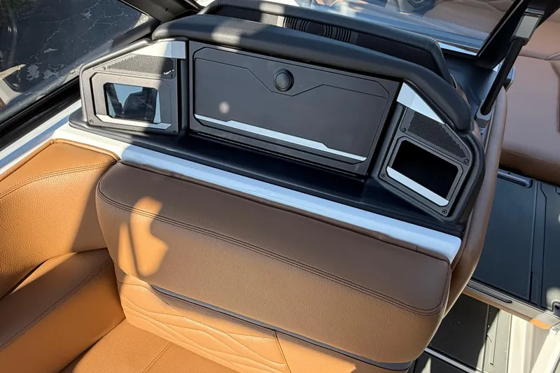 Slide: The Image of 2026 Supra SA 550 interior with brown leather seating and modern dashboard design. - 15