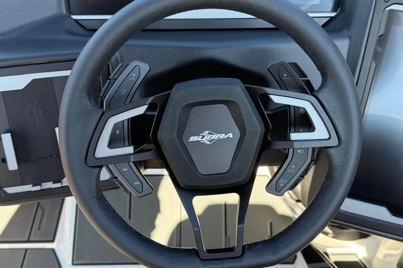 Slide: The Image of Steering wheel of 2026 Supra SA 550 with integrated controls and modern design. - 16