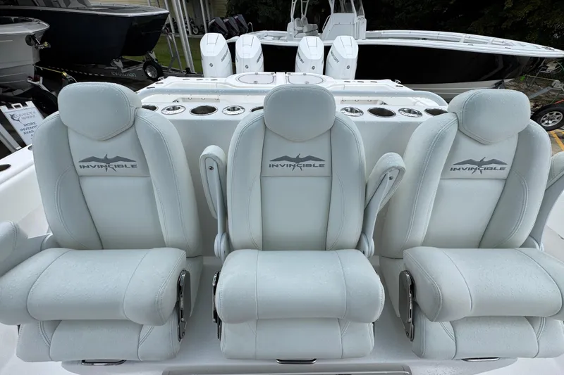 Slide: The Image of Luxurious seating on 2025 Invincible 40 Catamaran, featuring premium white upholstery. - 34
