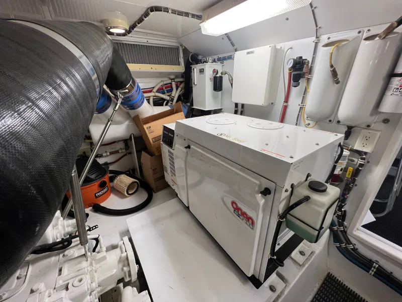 Slide: The Image of Engine room of 2008 Hatteras 64 Motor Yacht with generator. - 22