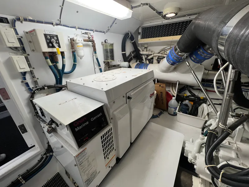 Slide: The Image of Engine room of 2008 Hatteras 64 Motor Yacht with generator. - 23