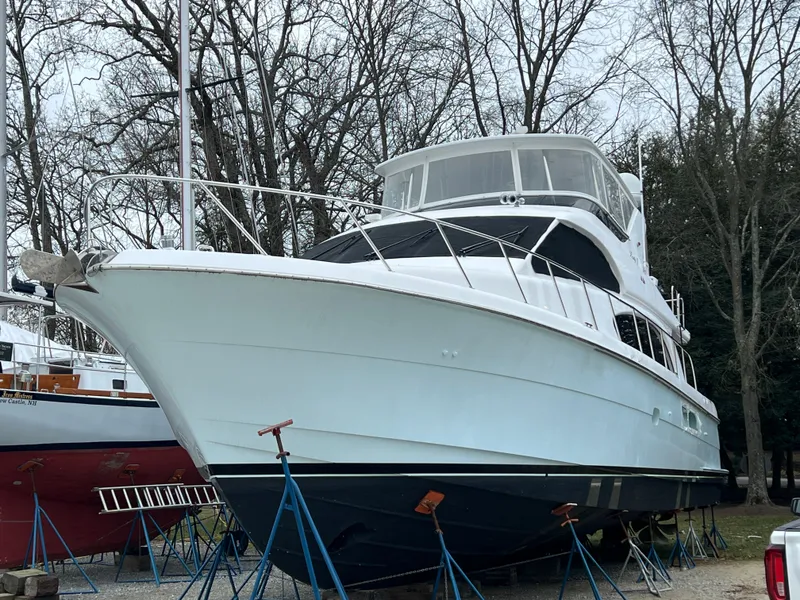 Slide: The Image of 2008 Hatteras 64 Motor Yacht on stands outdoors. - 28