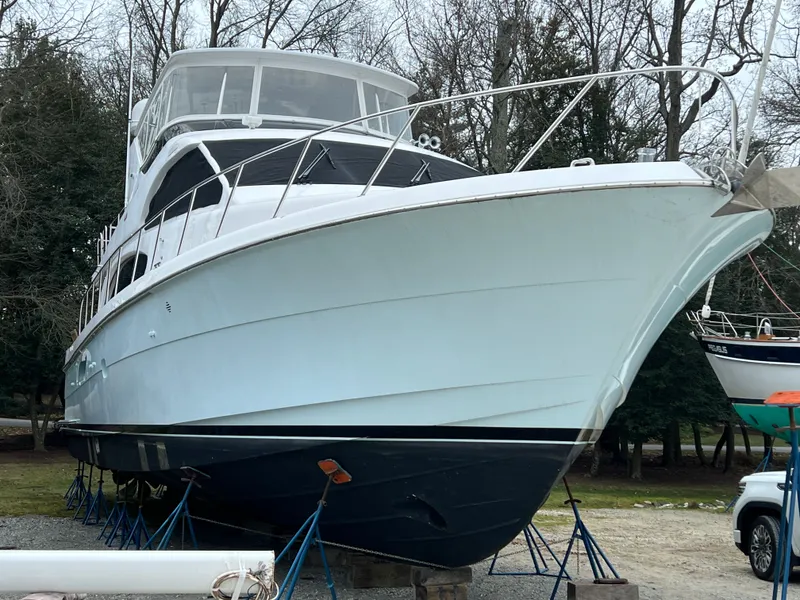 Slide: The Image of 2008 Hatteras 64 Motor Yacht on stands outdoors. - 30