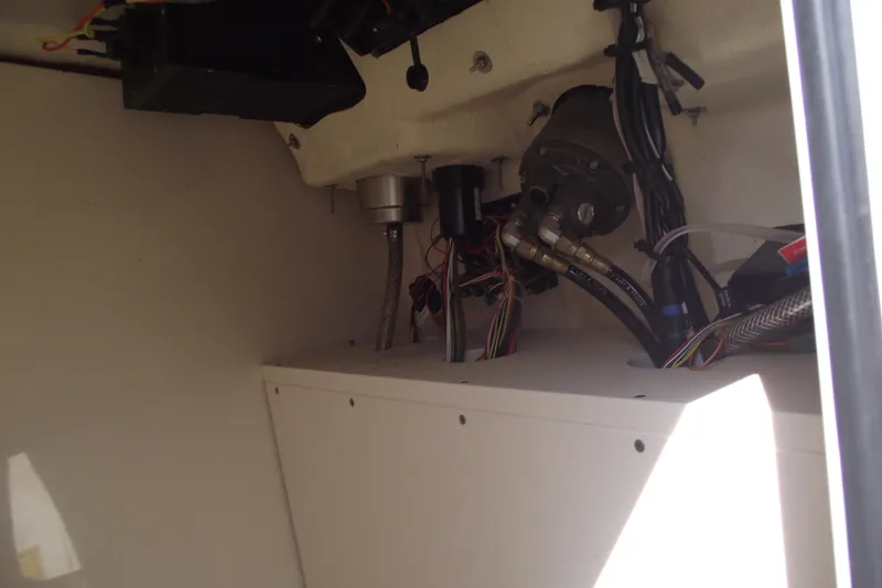 Slide: The Image of Interior wiring and components of a 2022 Scout 215 Dorado boat. - 25