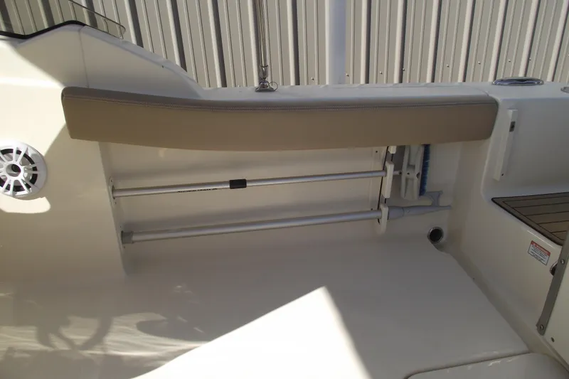 Slide: The Image of 2022 Scout 215 Dorado boat interior with seating and storage features. - 27