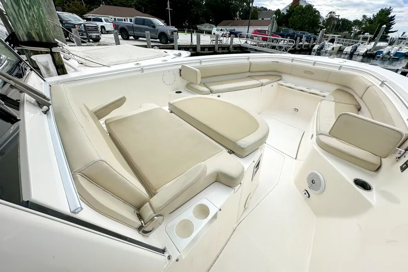 Slide: The Image of 2015 Cobia 344 Center Console boat with spacious seating and cup holders. - 29