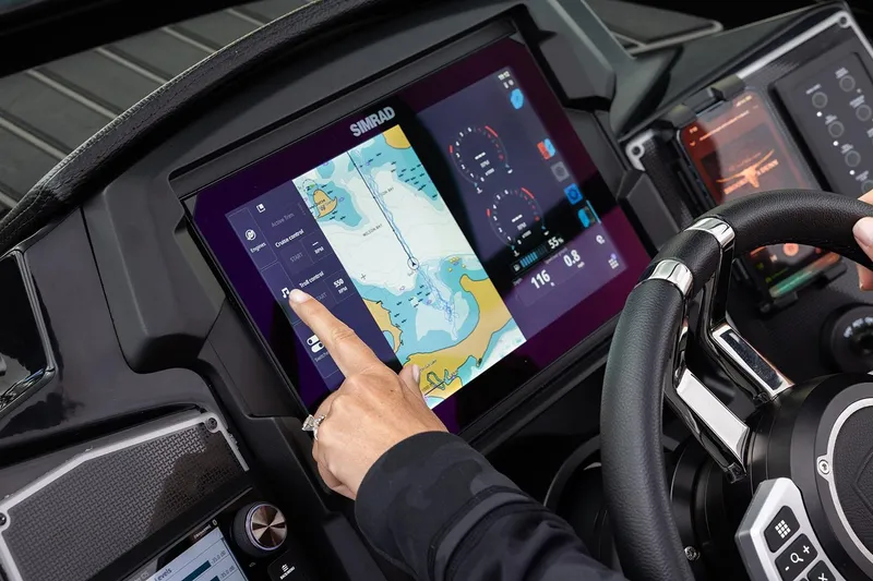Slide: The Image of Touchscreen navigation on 2026 Premier 270 Super Sport boat dashboard. - 2