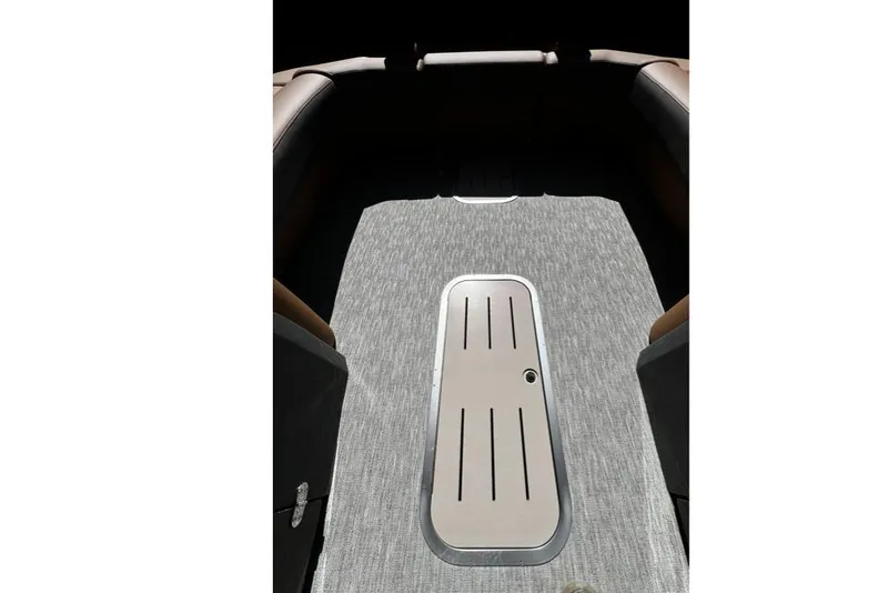 Slide: The Image of 2026 Bennington Swingback 25 boat interior with sleek flooring design. - 13