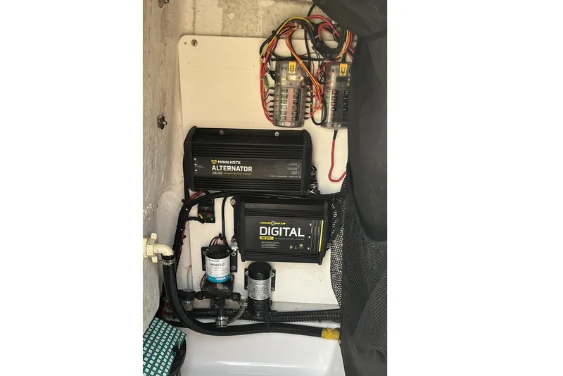 Slide: The Image of 2019 Sportsman Masters 227 Bay Boat electrical system with Minn Kota alternator and digital charger. - 16