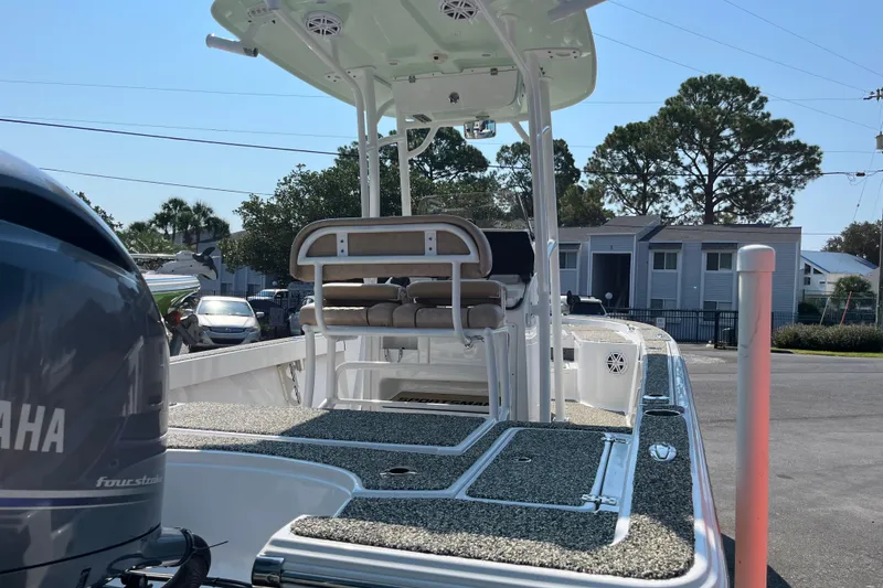 Slide: The Image of 2019 Sportsman Masters 227 Bay Boat with Yamaha engine, parked outdoors. - 6