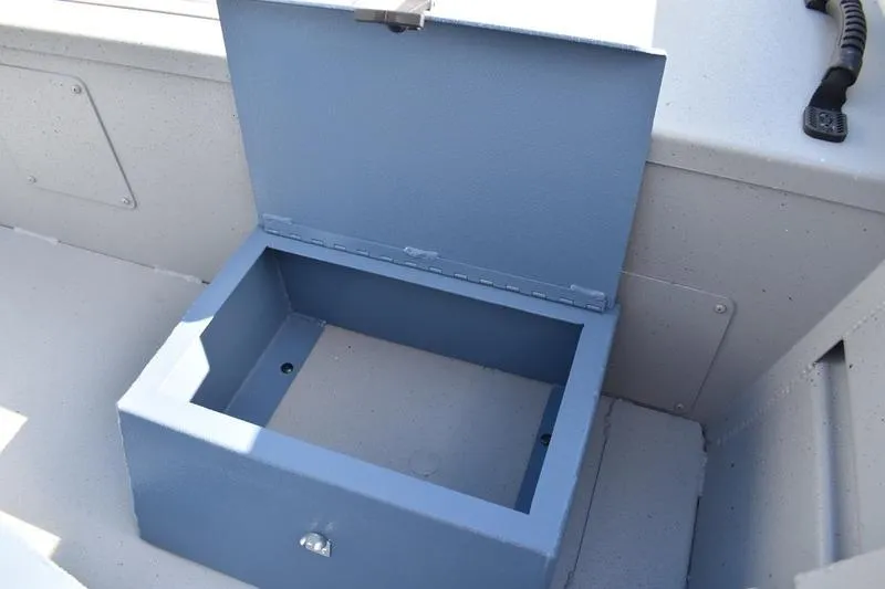 Slide: The Image of Open storage compartment on 2025 Lowe Roughneck RX1860 CC boat. - 12