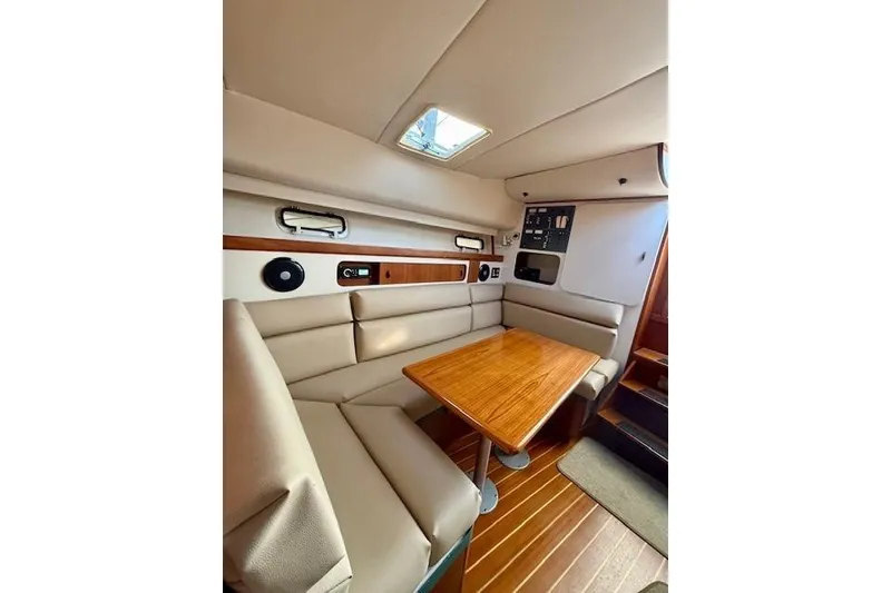 Slide: The Image of Fusion MS-RA70 stereo on 1996 Pursuit 3100 Offshore, playing Foo Fighters' "Wheels." - 18