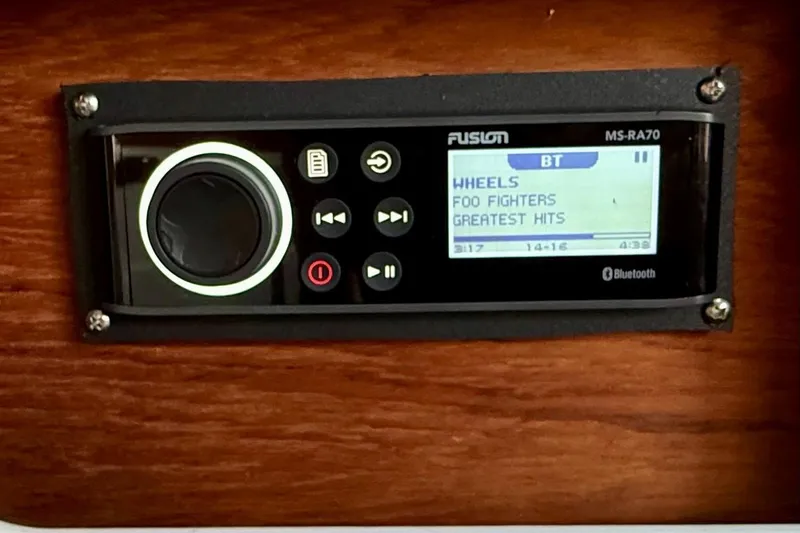 Slide: The Image of Thermostat control panel on a 1996 Pursuit 3100 Offshore boat, displaying temperature. - 19