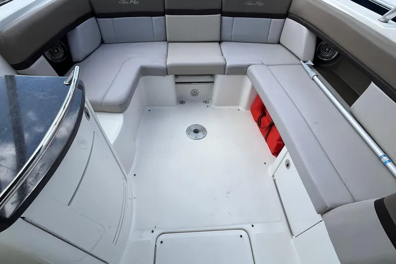 Slide: The Image of Interior of 2011 Sea Ray 270 SLX boat with spacious seating and sleek design. - 5