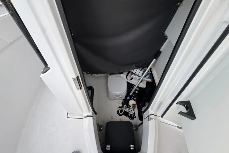 Slide: The Image of Storage compartment of 2020 Blackfin 212 CC boat with fishing gear and equipment. - 24