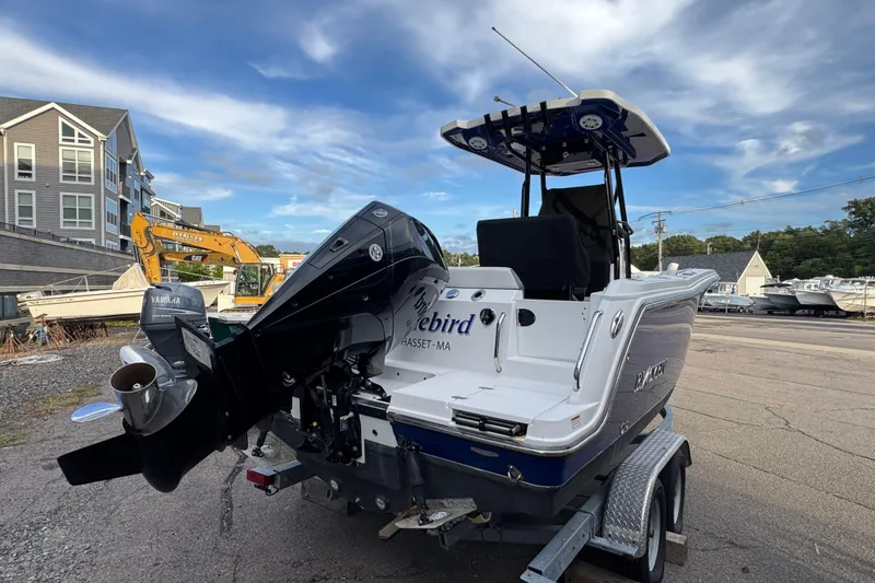 Slide: The Image of 2020 Blackfin 212 CC boat on trailer, Yamaha engine, outdoor setting. - 5