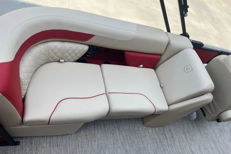 Slide: The Image of Luxurious seating on 2026 Godfrey SWEETWATER 2286 SB pontoon boat, featuring red and beige upholstery. - 10
