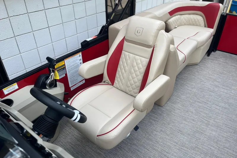 Slide: The Image of Luxurious seating in 2026 Godfrey SWEETWATER 2286 SB pontoon boat, featuring beige and red upholstery. - 15