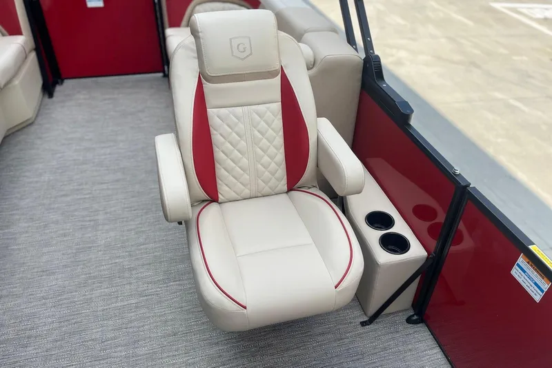 Slide: The Image of Luxurious seating on 2026 Godfrey SWEETWATER 2286 SB pontoon boat with cup holders. - 16