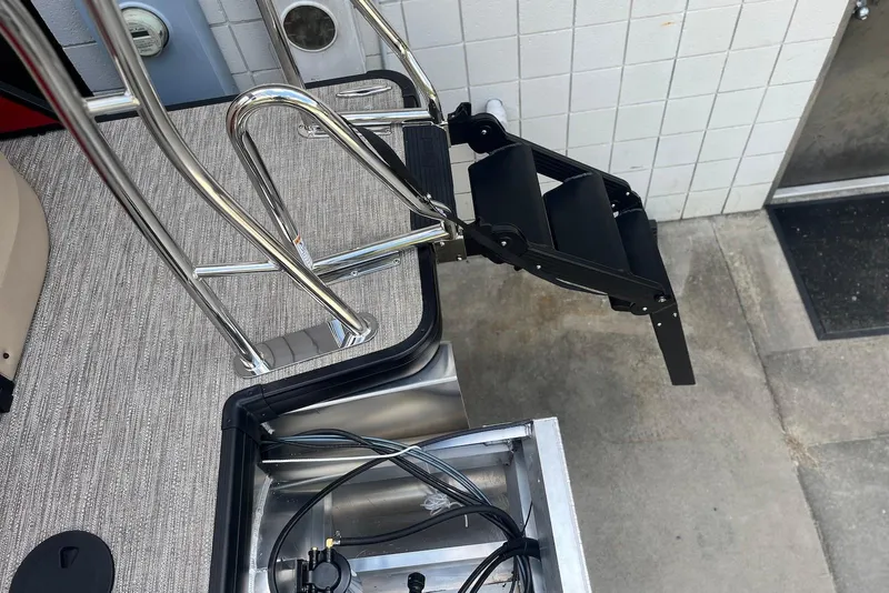 Slide: The Image of 2026 Godfrey SWEETWATER 2286 SB boat ladder and deck detail. - 25