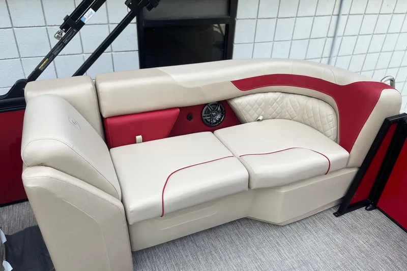 Slide: The Image of Luxurious seating on 2026 Godfrey SWEETWATER 2286 SB pontoon boat, featuring red and beige upholstery. - 8