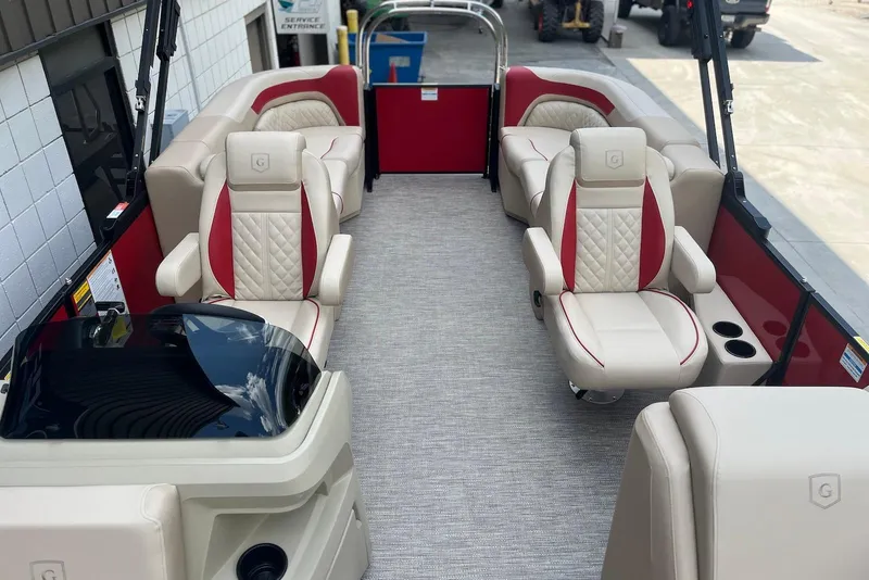Slide: The Image of 2026 Godfrey SWEETWATER 2286 SB pontoon boat interior with luxurious seating and modern design. - 9