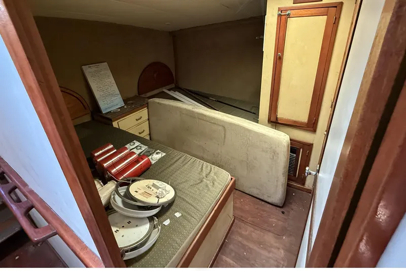 Slide: The Image of Interior of 1978 Marine Management 48 Sport Fish boat with storage and equipment. - 33