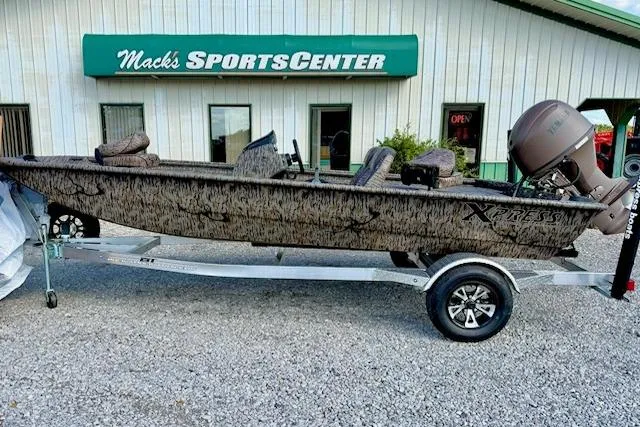 The Image of 2026 Express Xp170 boat on trailer outside Mack's Sports Center. - 1