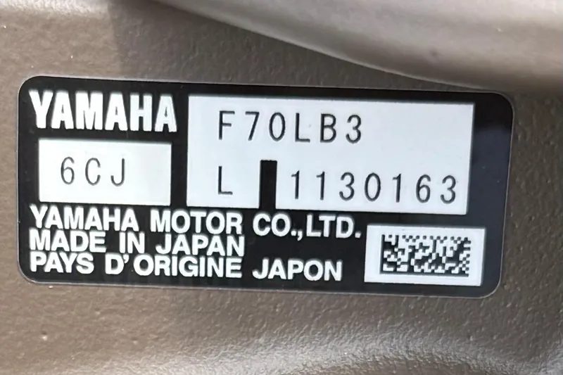 Slide: The Image of Yamaha motor label, model F70LB3, made in Japan, serial number 1130163. - 12