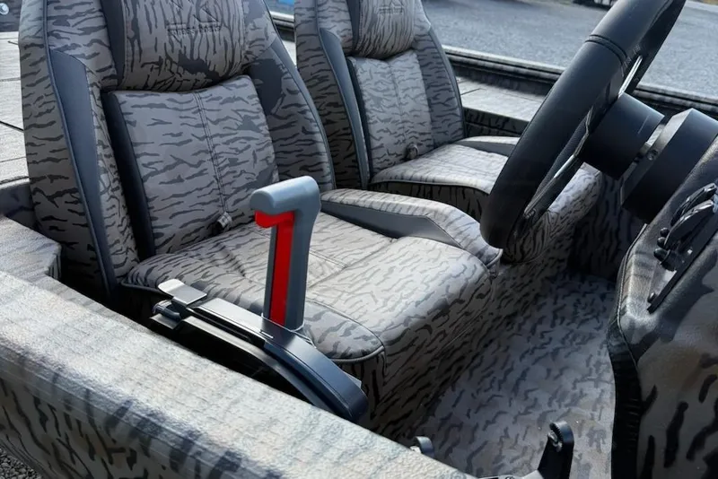 Slide: The Image of 2026 Express Xp170 interior with patterned seats and steering wheel, showcasing modern design. - 6