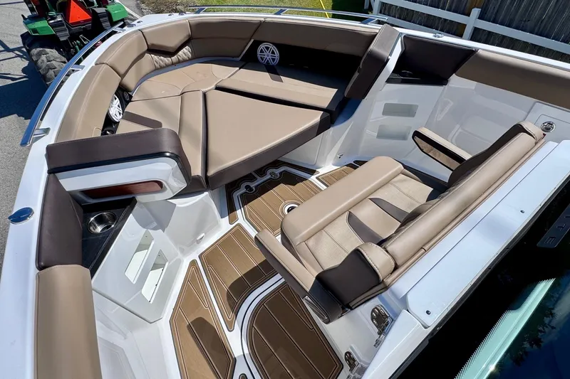 Slide: The Image of 2026 Monterey Elite 30 OB boat interior with luxurious seating and modern design. - 17