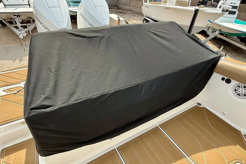 Slide: The Image of Covered seating area on 2026 Monterey Elite 30 OB boat deck. - 28