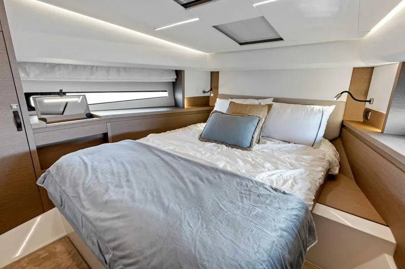 Slide: The Image of Luxurious bedroom interior of 2023 Prestige 460 Flybridge yacht with modern design. - 2