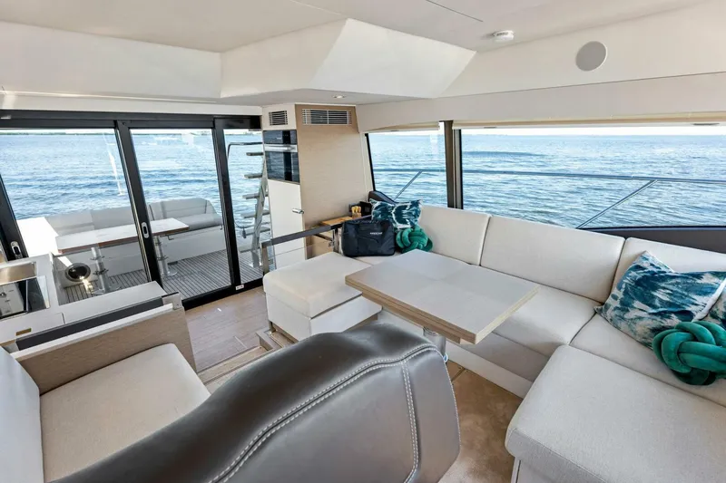 Slide: The Image of Luxurious interior of 2023 Prestige 460 Flybridge yacht with ocean view. - 4