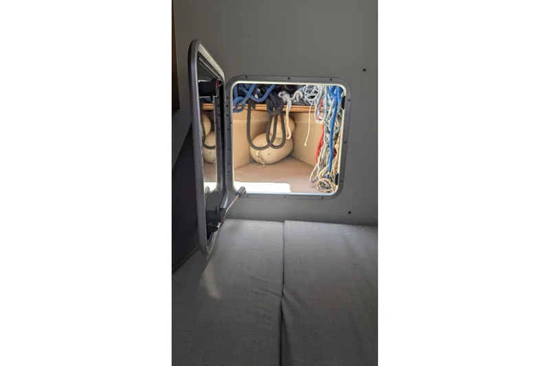 Slide: The Image of Interior view of Nautitech 40 Open 2016 catamaran with open hatch and ropes. - 15