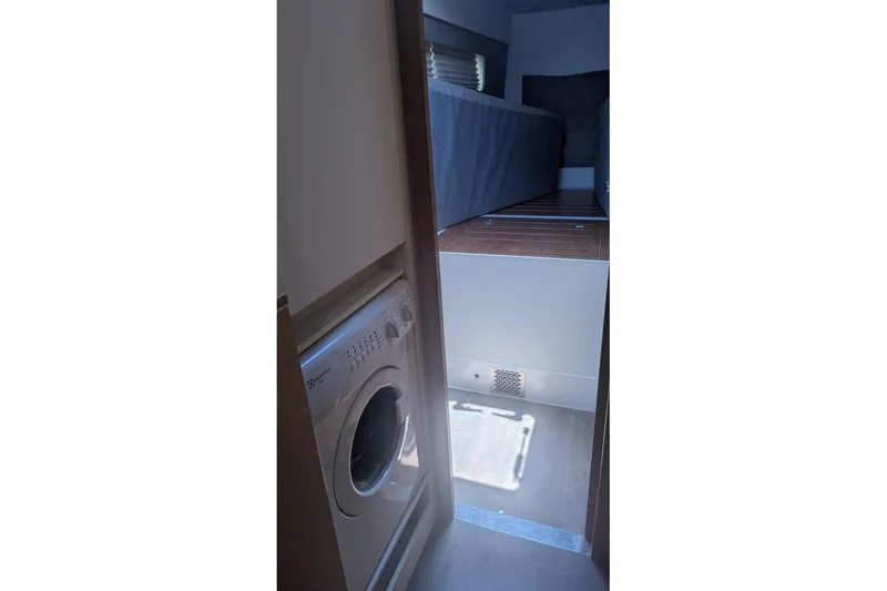 Slide: The Image of Interior of 2016 Nautitech 40 Open catamaran with washing machine and cozy sleeping area. - 20