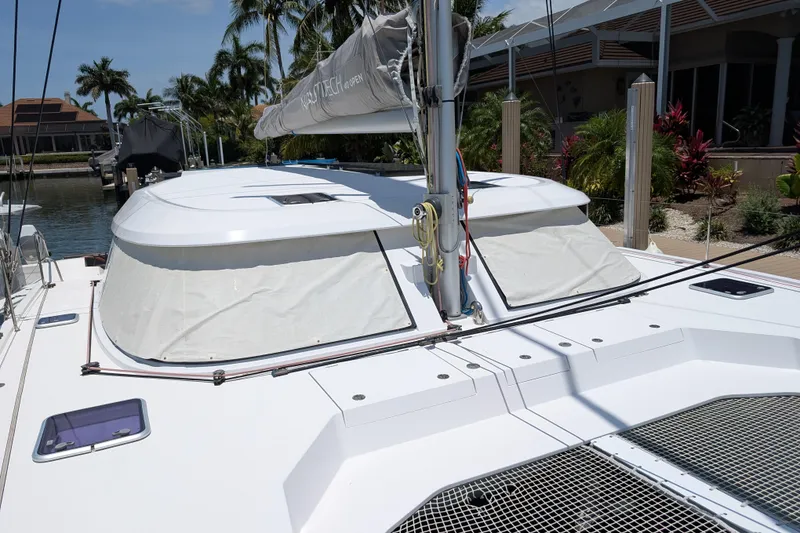 Slide: The Image of 2016 Nautitech 40 Open catamaran docked, featuring sleek design and spacious deck. - 27
